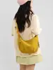 Bolso bandolera de gran capacidad para mujer, nuevo modelo 2026, bolso de hombro, mochila deportiva versátil, bolsa tipo albóndiga de color sólido para almacenamiento