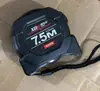 Cinta métrica de acero fluorescente autoblocante Alta precisión Grabado láser Caja Negro Dorado Regla Herramienta de medición Resistente al desgaste