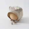 Touca de Bebê Estilo Coreano Fofa Cor Sólida Flor Pequena Versátil Proteção para Orelhas Infantil Chapéu para Uso Externo à Prova de Vento Casual
