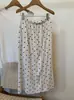 Saia Nova de Bolinhas com Fenda para o Verão 2026, Estilosa e Versátil para o Dia a Dia, Cintura Elástica, Design Emagrecedor e Moderno