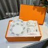Suministro Directo de Fábrica H Marca Taza y Platillo de Café Juego de Porcelana Hueso Juego de Té de la Tarde Taza de Té Negro Taza y Platillo Doble de Lujo Ligero Regalo de Boda