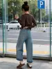 A primavera não está atrasada, jeans reto feminino de duas vias, calças de vovó elásticas afuniladas novas para o outono de 2026, calças de perna larga de nove pontos