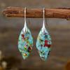 Nuevos pendientes colgantes de hojas de piedra natural bohemios europeos y americanos de moda, joyería retro de estación independiente transfronteriza.