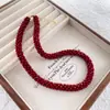 Collar Transfronterizo de Perlas Rojas para Mujer, Cadena Clavicular Retro de Alta Gama, Joyería de Vidrio Perlado de Lujo Ligero de Nicho al por Mayor