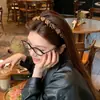 Diadema de Moda Retro Maillard con Estampado de Leopardo para Mujer 2025 Nueva Gama Alta con Dientes Antideslizante Calavera Alta Versátil