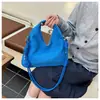 2025 Bolso Nuevo Transfronterizo Bolso de Hombro Mate Estilo Simple para Mujer Bolso Triángulo para Mujer Color Sólido Bolso de Mano Casual