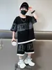 Conjunto Esportivo Infantil 2025 Verão Novo Estilo Crianças Estilo Coreano Manga Curta Tamanhos Médio e Grande Crianças Tendência Shorts Conjunto de Duas Peças