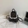 Mochila linda de estilo coreano de nicho con ribete de encaje, nuevo modelo 2026, mochila escolar de lunares dulce y fresca para niña, PU