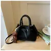 Bolsa de Textura Trançada de Nicho de Luxo Feminina 2026 Nova Moda Retro Versátil Bolsa Transversal Bolsa de Mão Bolsa Saco