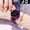 TikTok spot venta al por mayor reloj de cuarzo estrellado para mujer reloj perezoso correa magnética reloj magnético