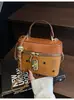 Bolsas de Nicho Transfronteiriças para Mulheres 2025 Primavera e Verão Nova Moda Portátil para Passeio Popular Ombro Único Transversal Saco de Balde