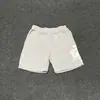 Marca de moda estilo americano SYNA WORLD Traje de manga corta estilo taladro High Street Hip Hop Ins Verano Pantalones cortos casuales para hombres y mujeres