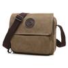 Bolso bandolera de hombro para hombre y mujer, venta al por mayor de fábrica, para turistas, con cremallera de color sólido, bolso informal de moda individual