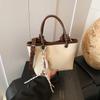 Bolsa balde texturizada de design nicho tendência primavera 2025 casual simples moda feminina estilo ocidental ombro mensageiro