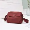 Bolsa Feminina Transfronteiriça de Alta Qualidade com Múltiplos Compartimentos, Bolsa de Ombro em Tecido de Nylon Impermeável para Mulheres, Novo Modelo 2026, Bolsa Transversal Casual Leve