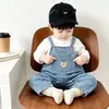 Mono para Bebés Niños y Niñas 2026 Primavera y Otoño Elegante Versátil Top de Manga Larga y Mono de Mezclilla Conjunto de Dos Piezas Moderno