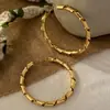 Pendientes de Aro Grandes Dorados Geométricos Huecos de Moda para Comercio Exterior Transfronterizo, Lujo Ligero, Sensación de Gama Alta, Pendientes Versátiles de Diseño de Nicho para Mujer