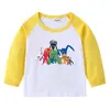 Camiseta infantil de primavera y otoño 2023, nueva camiseta de manga larga con cuello redondo y dibujos animados, camiseta de algodón para bebés y niños.