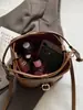 Bolsa de cubo suave de PU de alta gama al por mayor para mujer 2025 Nueva moda moderna Bolso de hombro versátil Bolso cruzado estilo occidental