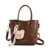 Bolso de mano minimalista de nicho para mujer 2026 versión coreana nuevo de alta gama para el trabajo casual moda versátil bandolera