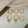 Pendientes de joyería de acero de titanio chapado en oro de 18 quilates con colgante de perla en forma de gota, nuevo de alta gama, lujo ligero, estilo frío, transfronterizos
