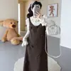 2025 Novo Suéter Vestido Longo de Tricô Pesado com Flores e Barra em Cauda de Peixe + Camisa de Manga Longa Rendada Conjunto Maternidade