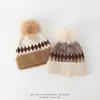 Gorro de punto jacquard estilo americano transfronterizo, gorro de pompón protector para orejas estilo coreano para niños mayores, gorro de lana cálido para niños de comercio exterior