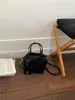 Bolsa de Mão Super Popular para Escritório para Mulheres, Novo Modelo Primavera/Verão 2026, Bolsa de Ombro Transversal Exclusiva de Nicho de Alta Qualidade para o Dia a Dia