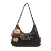 Mochila tote retro de gran capacidad estilo coreano transfronteriza para mujer, con un diseño minimalista y único, adecuada para el uso diario como bolso de mano o bolso cruzado