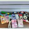 Portatarjetas deslizante Snoopy de comercio exterior, funda protectora linda de gato KT para tarjeta de acceso al campus y de autobús, cordón para tarjeta de acceso al metro
