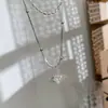 Collar de plata rota con amor Saturno de circón microincrustado para mujer, doble cadena apilada en la clavícula, cadena para suéter de lujo ligero de alta gama para mujer