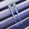 Nuevos pendientes creativos de copo de nieve con explosiones en vivo de TikTok con incrustaciones de ocho corazones y ocho flechas de circonita, pendientes largos de joyería.