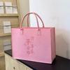 Bolsas de fieltro procesado se pueden personalizar con logotipos, adecuadas como recuerdos, bolsas de gran capacidad, bolsas de mano, almacenamiento de regalos y se pueden personalizar