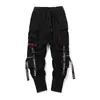 Pantalones de hip hop europeos y americanos de verano pantalones de moda overol con cinta estilo coreano para hombre marca de moda pantalones ajustados modernos finos para hombre