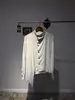 Camisa versátil, de nicho, estilo corte, de manga larga, con cuello alto, diseño retro, bajo asimétrico fluido, corte entallado y estilo sofisticado