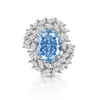 Anillo de Flor de Hielo con Gema de Color Brillante de Corte Huevo de Paloma Oversize de Venta Caliente Transfronteriza para Mujer Moda Europea y Americana Joyería de Diamante de Alto Carbono Brillante