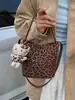 Bolso tipo cubo retro de estampado de leopardo de nicho estilo coreano de alta moda, nuevo de otoño 2026, bandolera minimalista Maillard personalizada