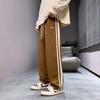 Calças casuais calças esportivas calças novas primavera e outono moda marca da moda juventude popular listrado tendência masculina solta