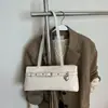 Bolsa de Ombro para Uso Diário Estilo Coreano Fashionável para Mulheres 2026 Nova Bolsa de Couro Oleado Versátil Simples Bolsa de Mão Transfronteiriça