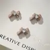 Uña Corazón de Dragón lazo incrustado cristal amor Diamante hermosa chica Corbata de lazo tridimensional resina uña pegar decoraciones de diamante