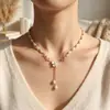 Moda Popular Transfronteriza Europea y Americana Flor de Perlas de Imitación con Borla Colgante Cadena Elegante para Clavícula para Mujeres