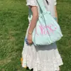 Bolsa Tote de Cordão Leve de Nicho Coreana para Mulheres Ombro Único Casual para Compras Grande Capacidade Simples para o Dia a Dia Bolsa de Lona