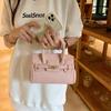 Bolso de diseño de nicho para mujer, novedad de verano de 2025, moderno bolso de platino, bolso de hombro con detalles a juego, bolso cruzado.