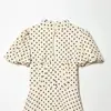 Ropa de mujer transfronteriza 2026 Moda europea y americana ajustada Vestido francés de lunares espina de pescado manga abullonada cuello alto para mujer A49043