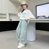 Conjunto de Verão para Meninas 2025 Novo Estilo Meninas Elegantes Manga Curta Crianças Médias-Grandes Roupa de Verão Fina Solta Conjunto de Duas Peças