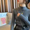 Suéter de cuello alto medio para mujer, adecuado para usar en capas, estilo nuevo Otoño/Invierno 2025, elegante, grueso, corte ajustado, tejido versátil
