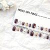 Fábrica de uñas pintadas a mano con dibujos animados de moda Tang, uñas prefabricadas de cabello liso, piezas de uñas terminadas, galletas Dora lindas hechas a mano para otoño e invierno