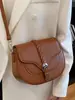 Bolso pequeño vintage 2026 nueva moda bolso de hombro de alta gama para debajo del brazo elegante versátil bandolera tipo silla de montar