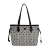 Bolso de mano elegante y de alta gama de gran capacidad para mujer, nueva colección 2026, adecuado para el trabajo diario, con diseño de lunares y rayas, y se puede llevar como bolso de hombro o bolso tote