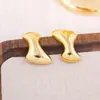 Pendientes Irregulares Geométricos de Moda Europea y Americana con Galvanoplastia de Oro Real Pendientes de Lujo Ligero de Nicho Pendientes de Venta Caliente Transfronteriza